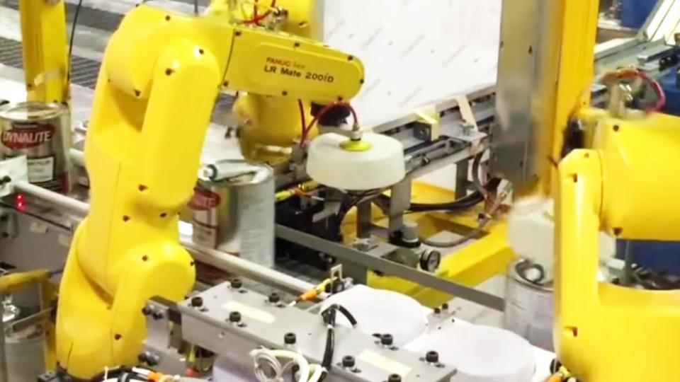 全自動(dòng)化裝配罐體產(chǎn)品包裝蓋